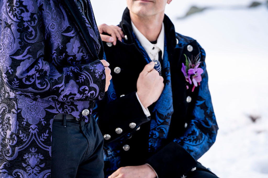 grooms in snow gay wedding