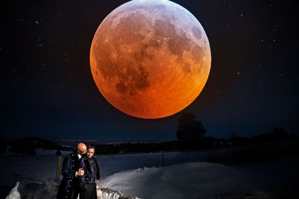 gay wedding couple in front of huge red moon