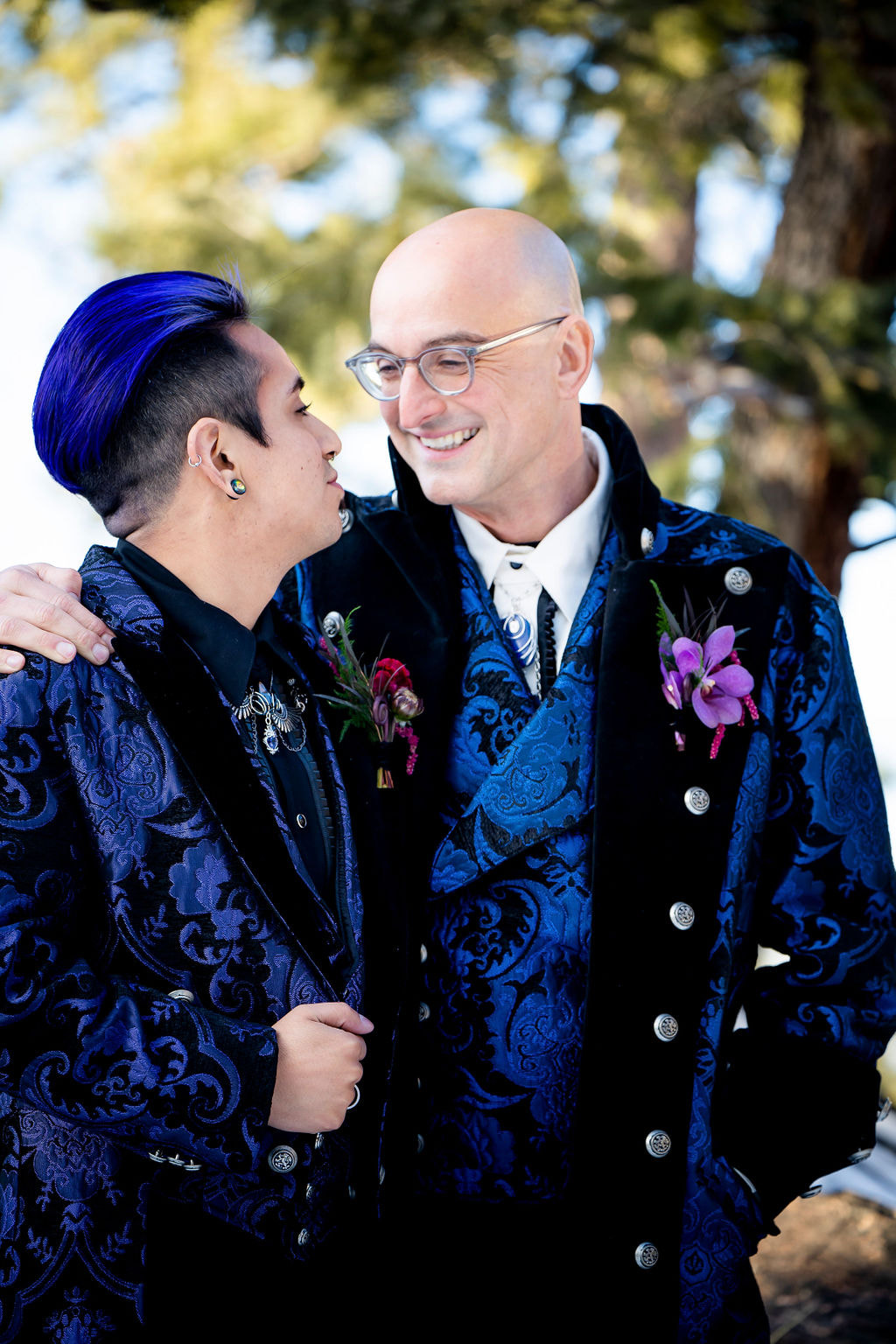 gay wedding grooms in blue jackets