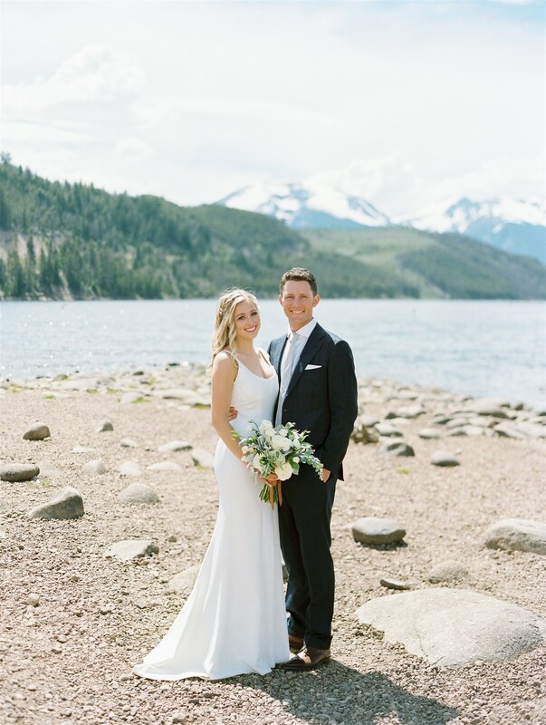 bride and groom mountain lake
