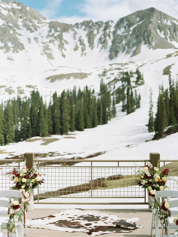 mountain wedding ceremony cowhide rug