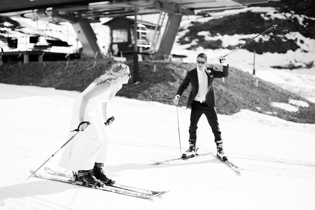 bride and groom skiing