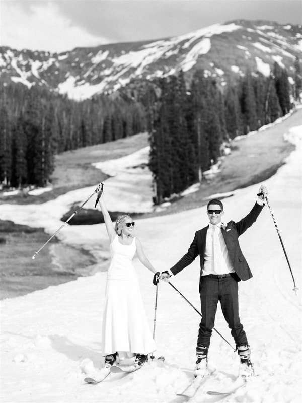 bride and groom on skis
