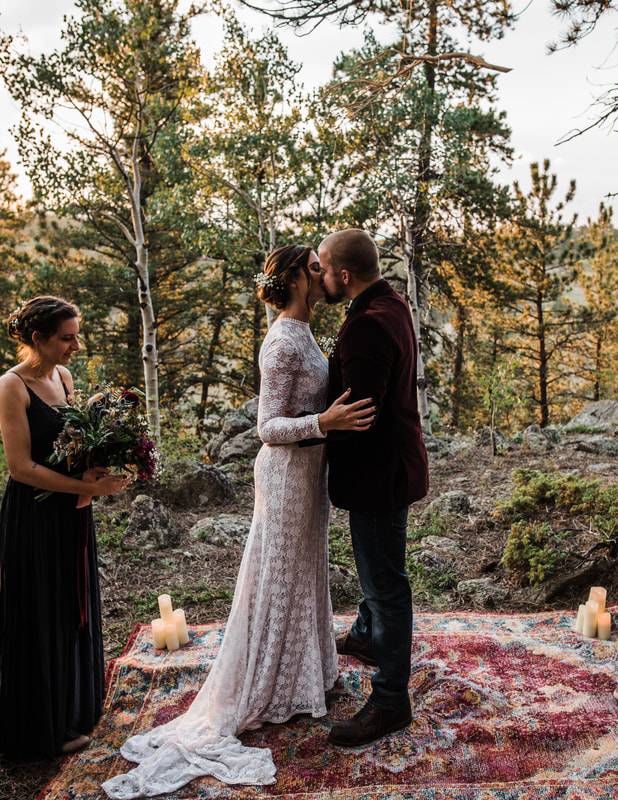 bride and groom kiss mountain wedding