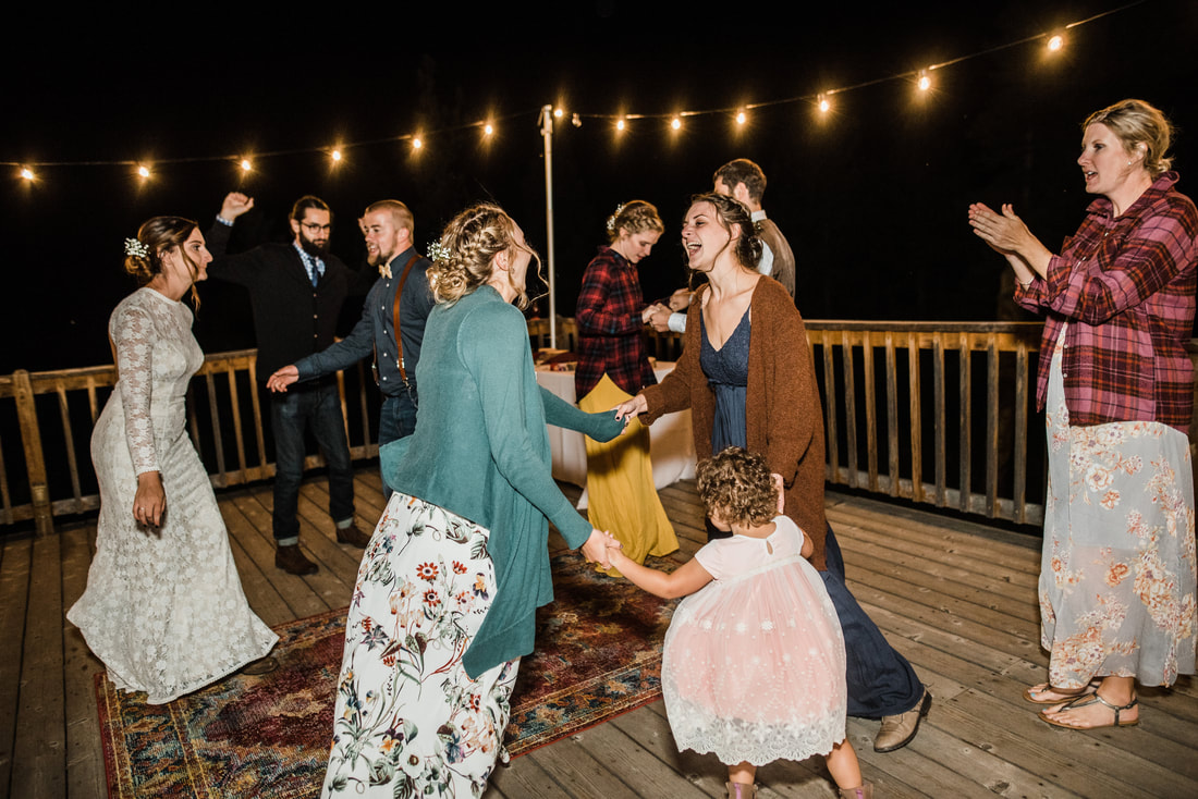 family dancing wedding elopement