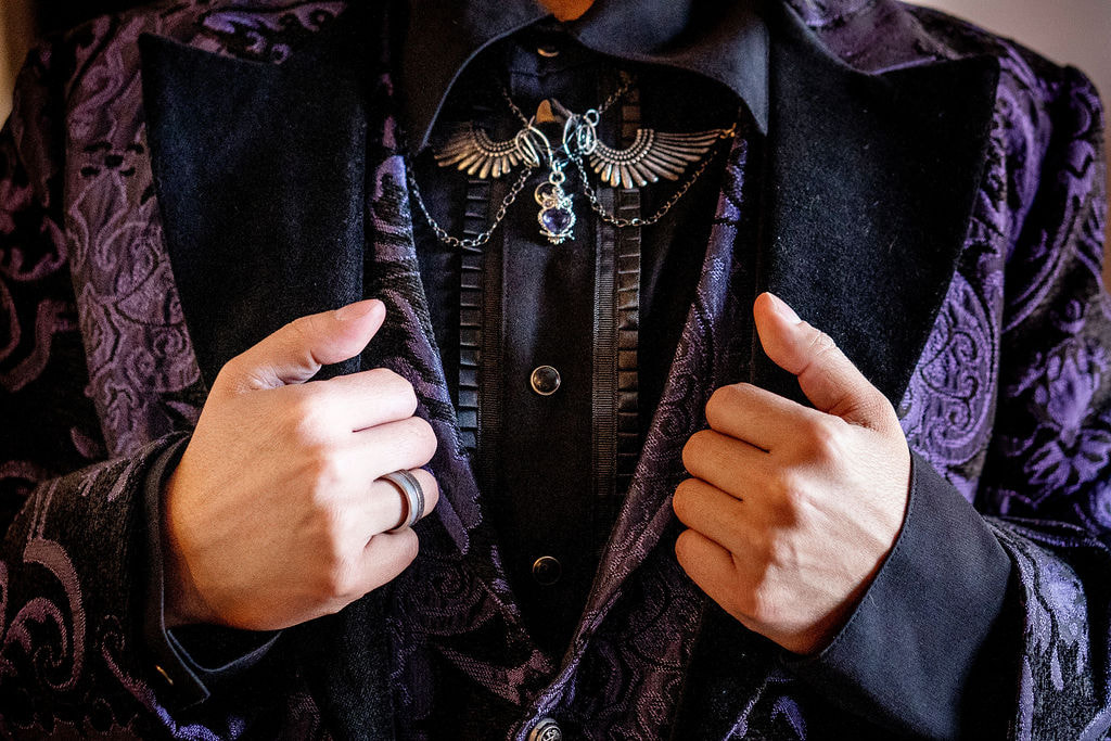 groom in purple brocade jacket