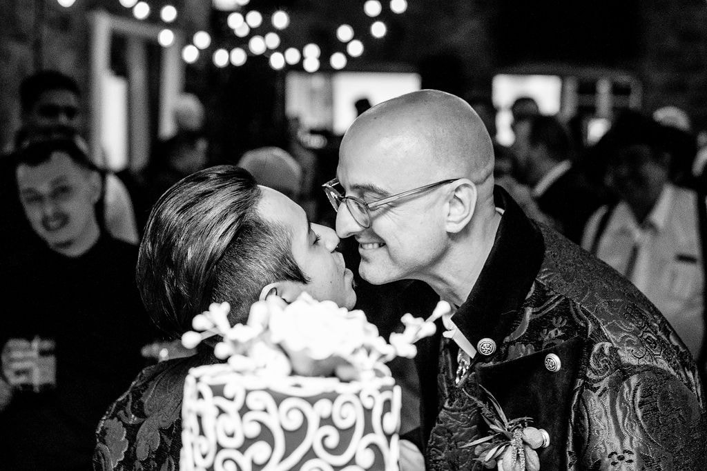 gay wedding couple kissing